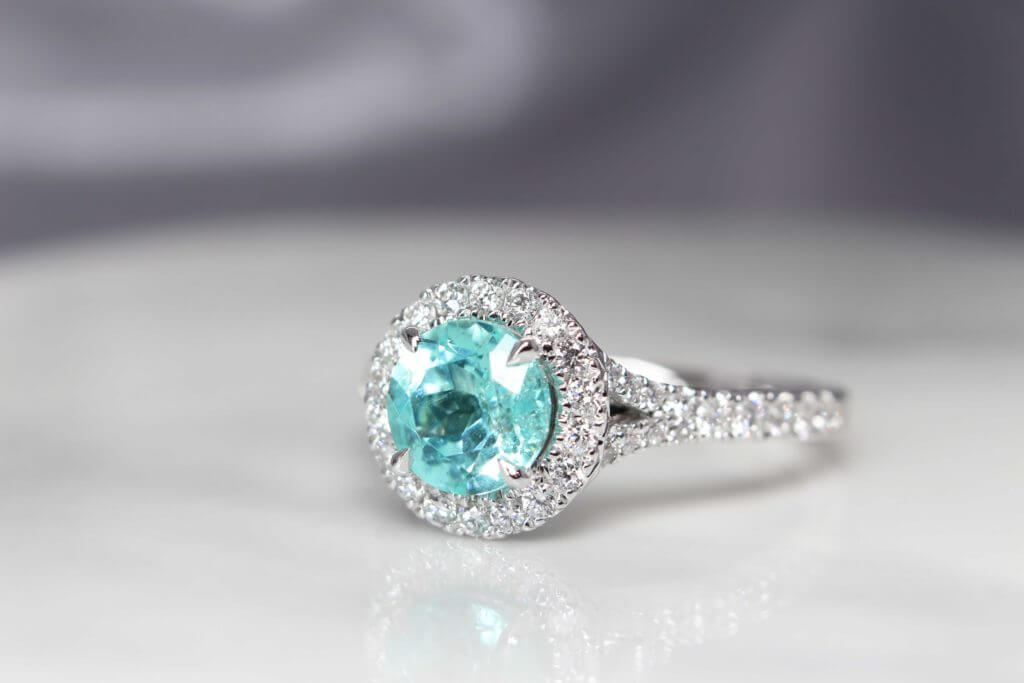 Customised electric blue or mint green Paraiba Tourmaline Proposal Ring  - custom made to different classic yet stylish pieces of wedding jewellery | Local Singapore Jeweller in customised jewellery with paraiba tourmaline coloured gemstone