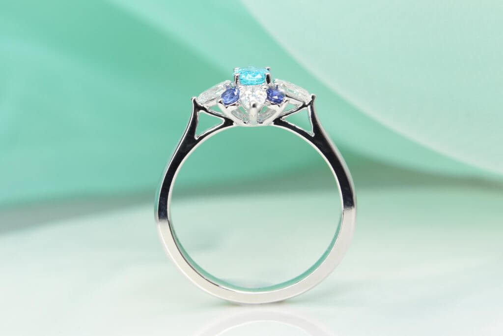 Brazil Paraiba Tourmaline Ring with pear-shaped diamond and blue sapphire a flora design - Customised Engagement Ring Mozambique & Brazil Paraiba Singapore.