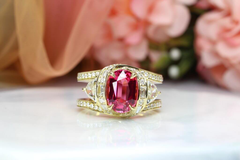 Mahenge Spinel Ring Pinkish Red | Bespoke Statement Jewelry chevron, baguette and brilliant round diamonds. Mahenge spinel in Tanzania | Singapore Bespoke Ring.