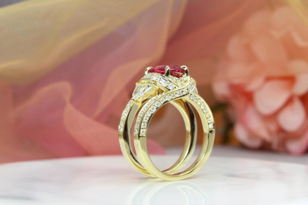 Mahenge Spinel Ring Pinkish Red | Bespoke Statement Jewelry chevron, baguette and brilliant round diamonds. Mahenge spinel in Tanzania | Singapore Bespoke Ring.