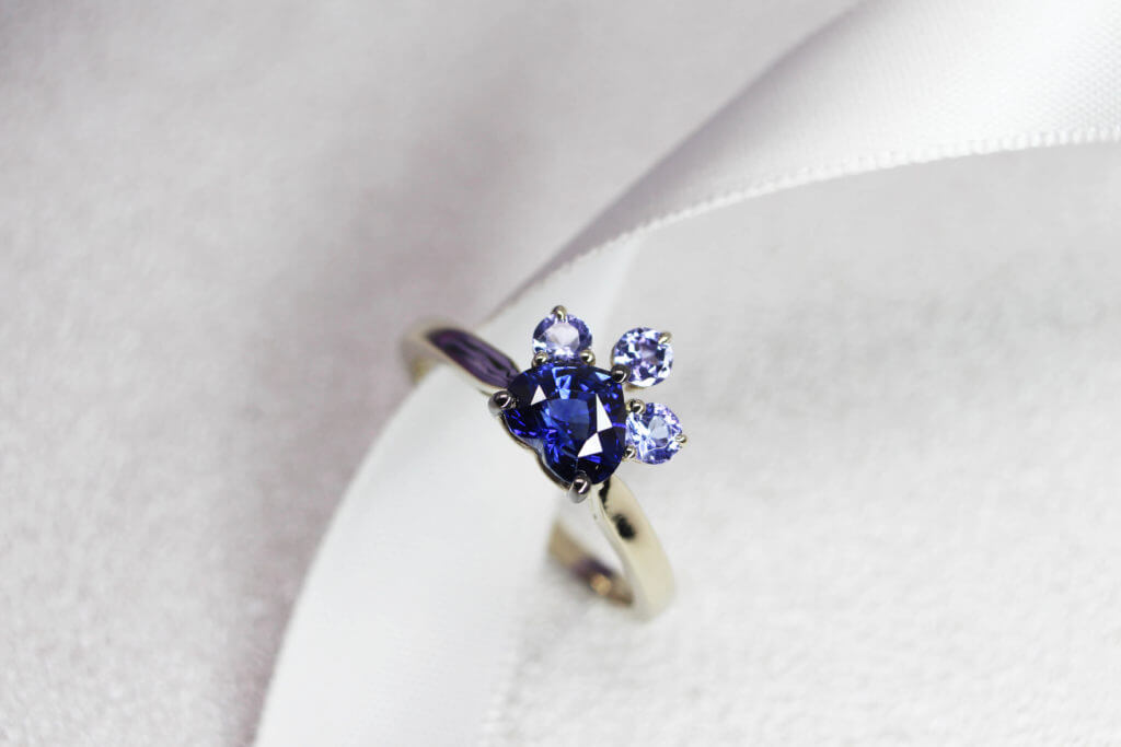 Personalized Engagement ring with sapphire cut to an elegant and unique heartshape, this deep blue sapphire ring appears magnificent in its form. This bespoke engagement ring speaks a unique story | Local Singapore Bespoke Jeweller in Personalized Engagement ring and Wedding Jewellery.