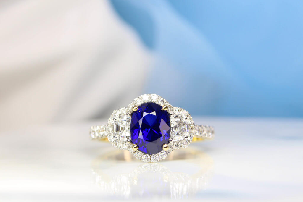 Sapphire Halo Diamond Ring with Half Moon, one of best vivid blue shade and highly saturation in the sapphire gemstone, yellow gold | Customised Blue Sapphire.