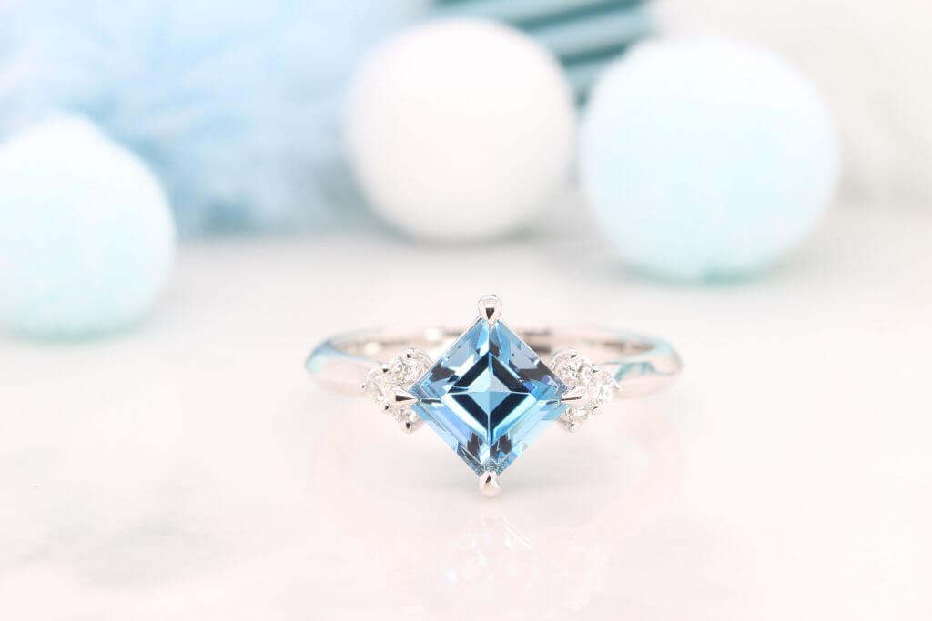 Santa Maria Africa coloured Aquamarine Engagement Ring, unique princess step cut aquamarine gem is customised with round brilliant cluster diamond - Singapore