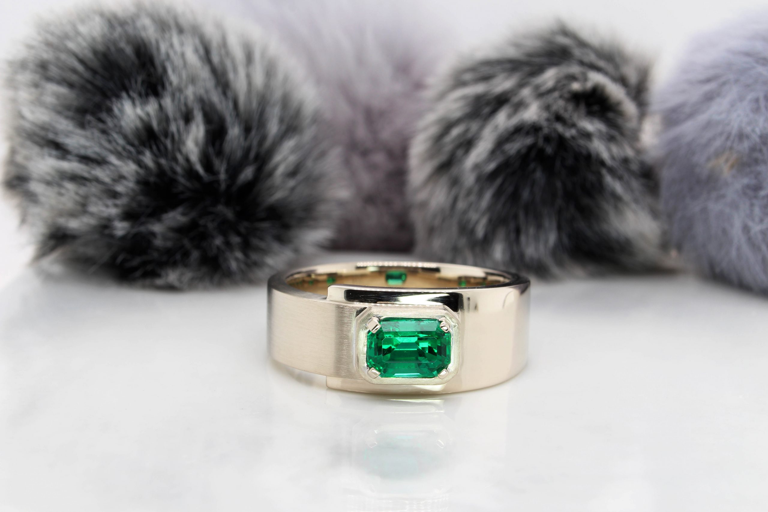 Wedding ring with on sale emerald